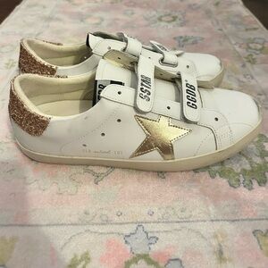 Women’s White and Gold Star Sneakers